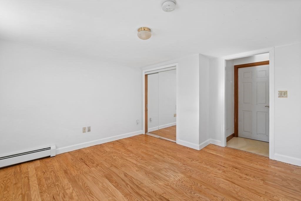 41 Durham Street Lawrence, MA 01843 - Photo 17 of 28 a view of empty room with wooden floor