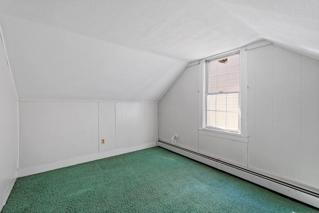 41 Durham Street Lawrence, MA 01843 - Photo 19 of 28 an empty room with a window