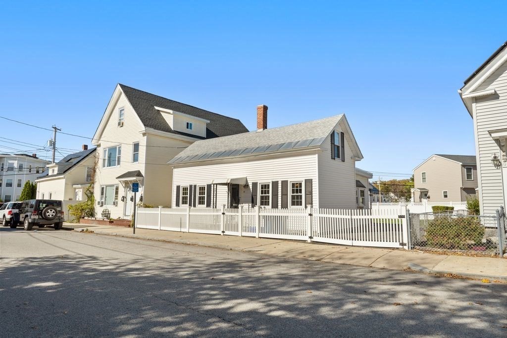 41 Durham Street Lawrence, MA 01843 - Photo 2 of 28 a view of a building with a street