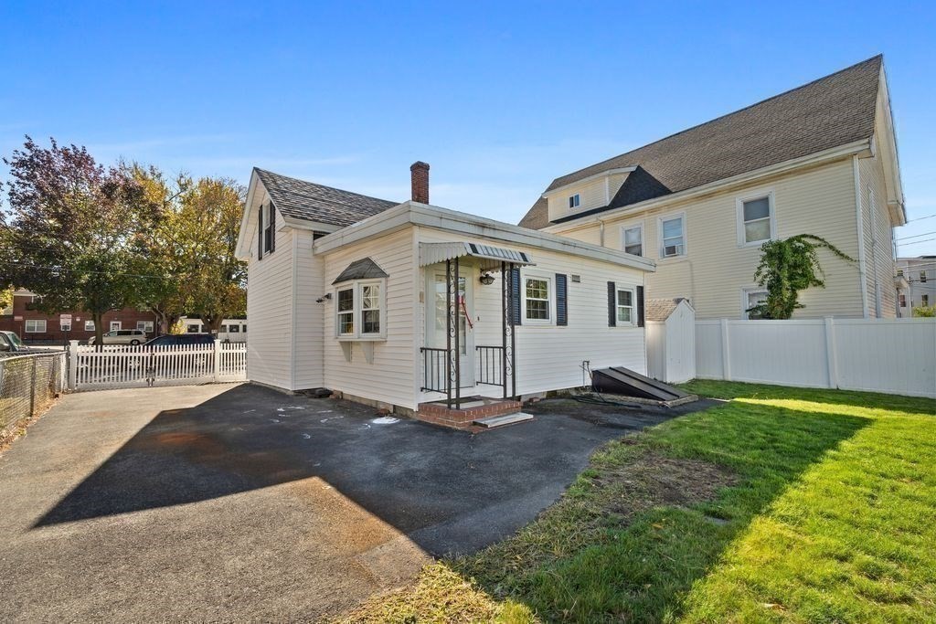 41 Durham Street Lawrence, MA 01843 - Photo 23 of 28 a view of a front of house with yard