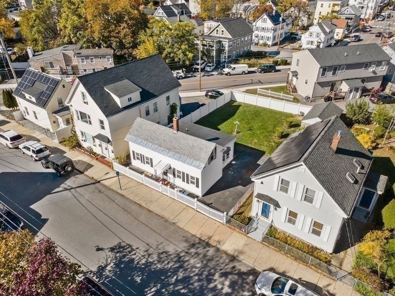 41 Durham Street Lawrence, MA 01843 - Photo 25 of 28 an aerial view of multiple houses with yard