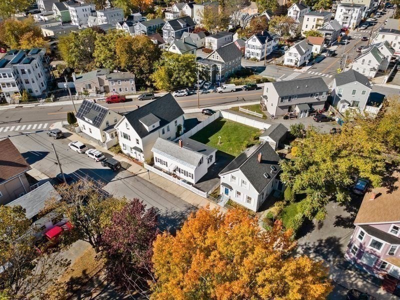41 Durham Street Lawrence, MA 01843 - Photo 3 of 28 an aerial view of multiple houses with yard
