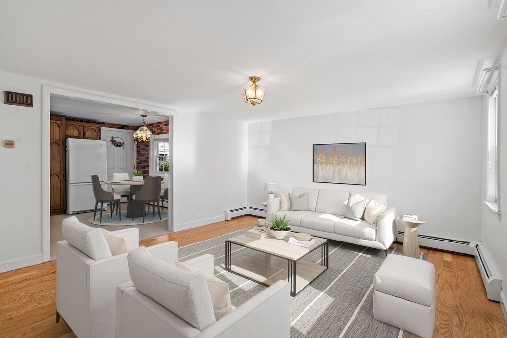 41 Durham Street Lawrence, MA 01843 - Photo 5 of 28 a living room with furniture and a table