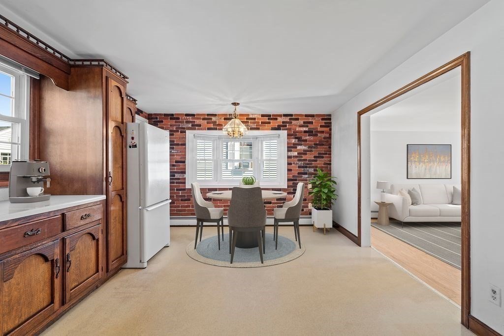 41 Durham Street Lawrence, MA 01843 - Photo 6 of 28 a view of a livingroom with furniture and a large window