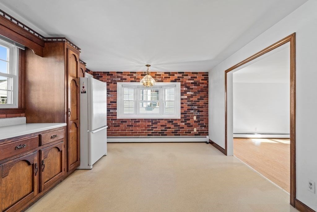 41 Durham Street Lawrence, MA 01843 - Photo 8 of 28 a view of an empty room and a window