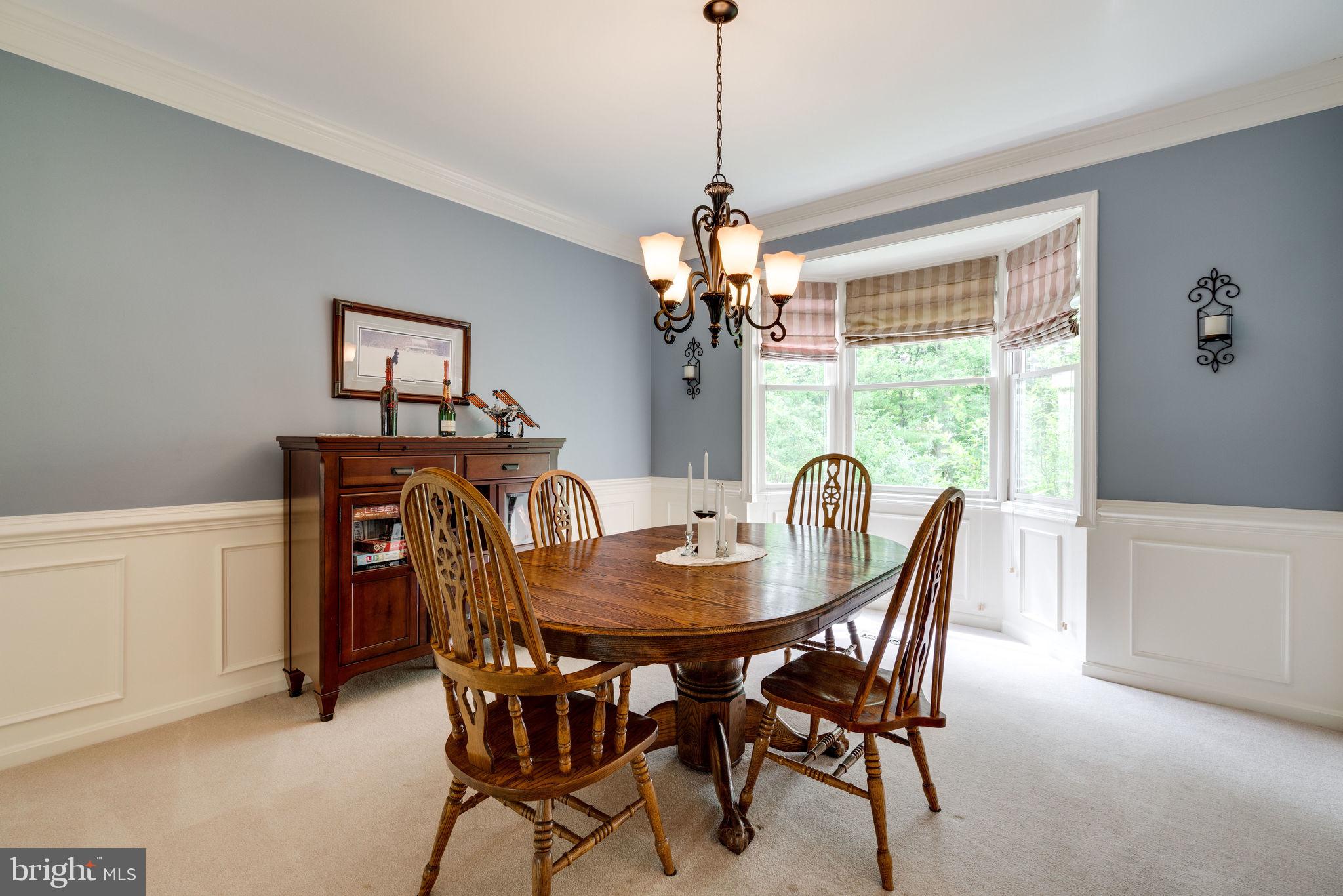 8959 Sycamore Ridge Road Fairfax Station, VA 22039 - Photo 18 of 63 Bay window looks out at the beautiful backyard.