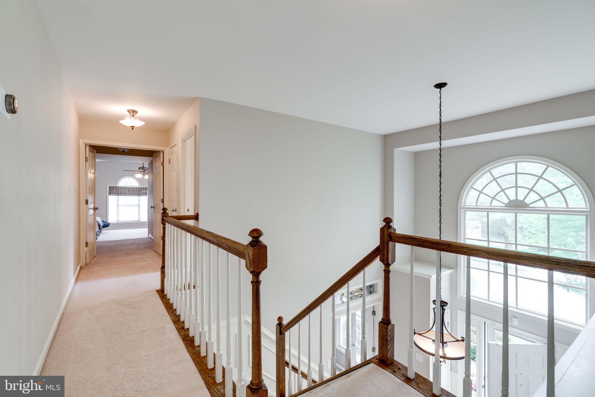 8959 Sycamore Ridge Road Fairfax Station, VA 22039 - Photo 31 of 63 Upstairs hall landing. Note the palladian window!