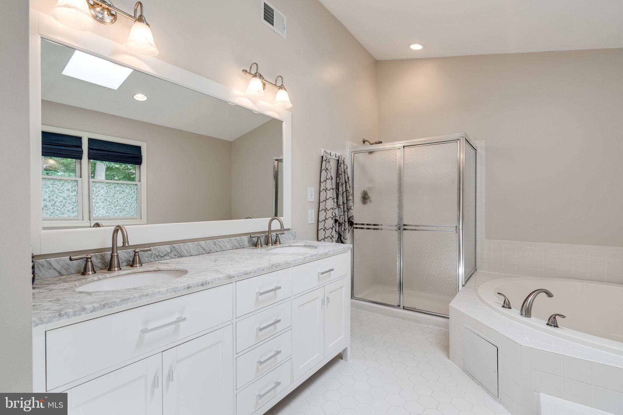 8959 Sycamore Ridge Road Fairfax Station, VA 22039 - Photo 44 of 63 Master bathroom has double sinks- updated vanity.