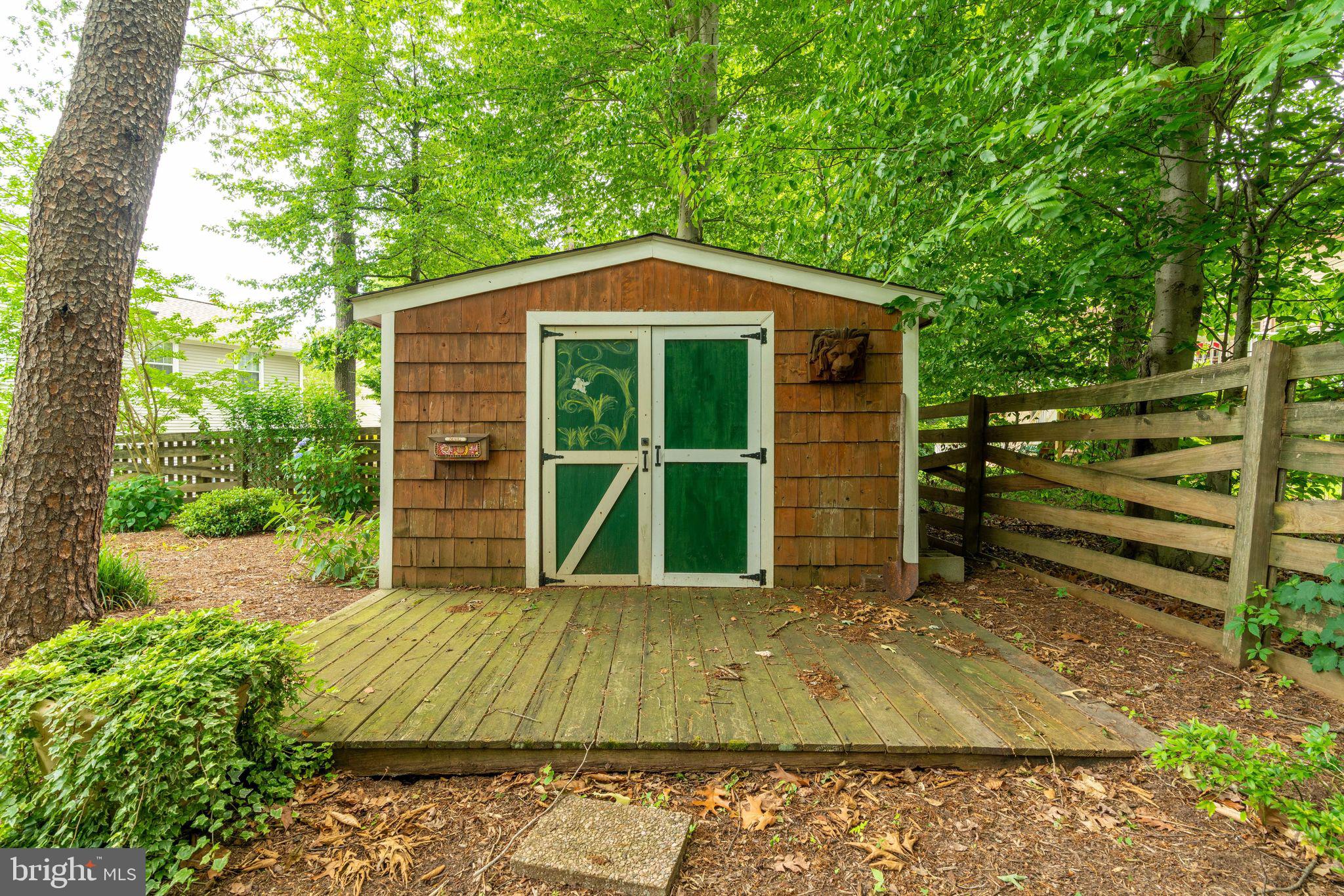 8959 Sycamore Ridge Road Fairfax Station, VA 22039 - Photo 60 of 63 Shed has deck area and backyard is fully fenced!