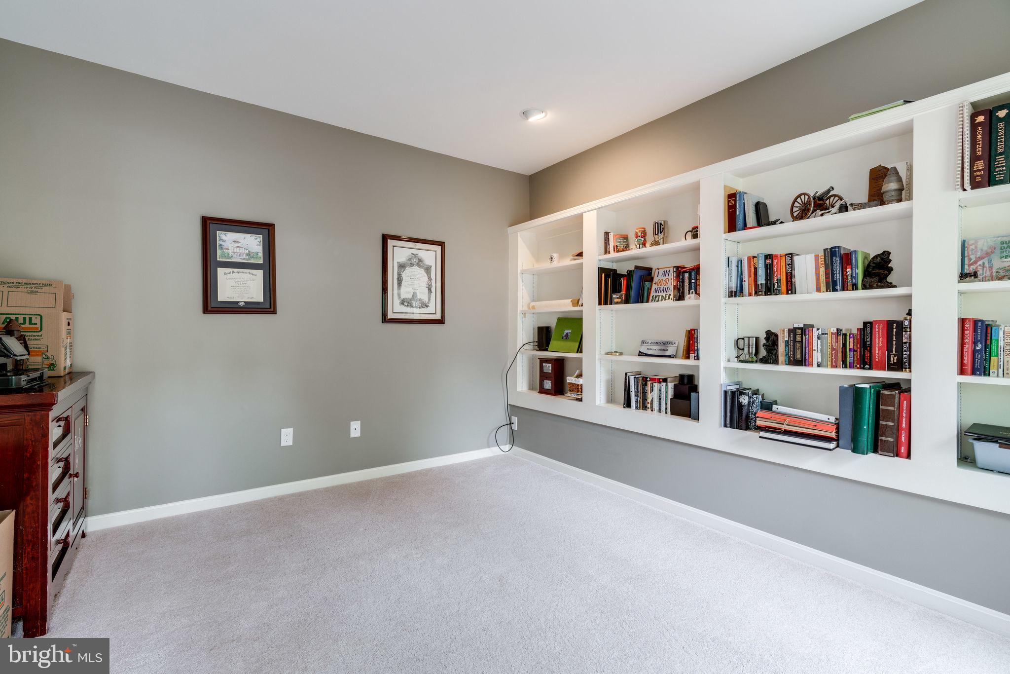 8959 Sycamore Ridge Road Fairfax Station, VA 22039 - Photo 7 of 63 Main level office with built-in shelving.