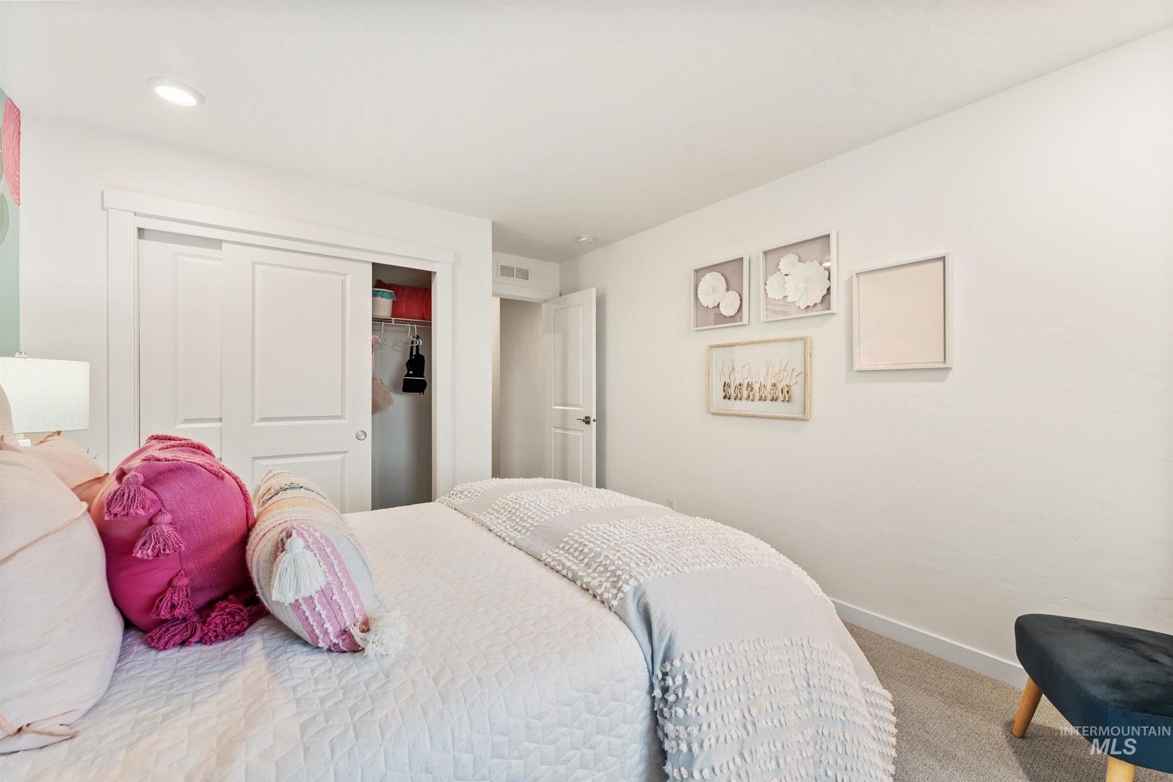 4149 South Colditz Way Meridian, ID 83642 - Photo 26 of 42 Carpeted bedroom featuring baseboards and a closet