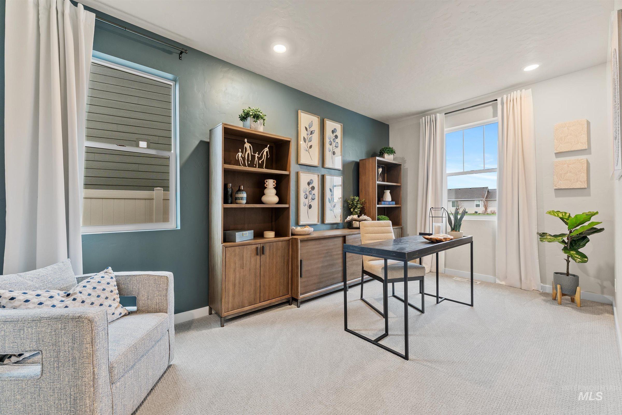 4149 South Colditz Way Meridian, ID 83642 - Photo 3 of 42 Home office with light colored carpet and recessed lighting