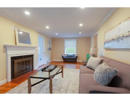3 Bernard Road Wellesley, MA 02481 - Photo 5 of 30 a living room with furniture and a fireplace