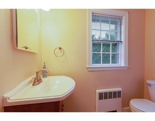 3 Bernard Road Wellesley, MA 02481 - Photo 8 of 30 a bathroom with a sink and a mirror