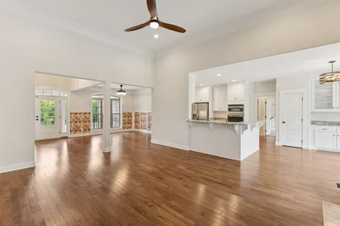 a kitchen with a sink stove and refrigerator