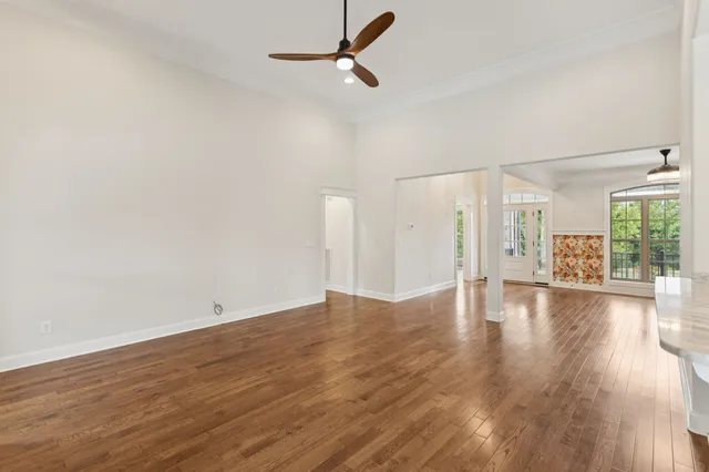 a kitchen with granite countertop a sink and a stove