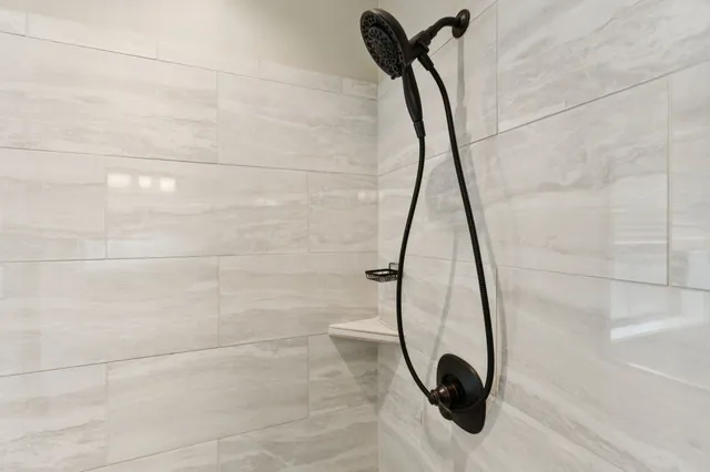 a view of a storage & utility room with a sink
