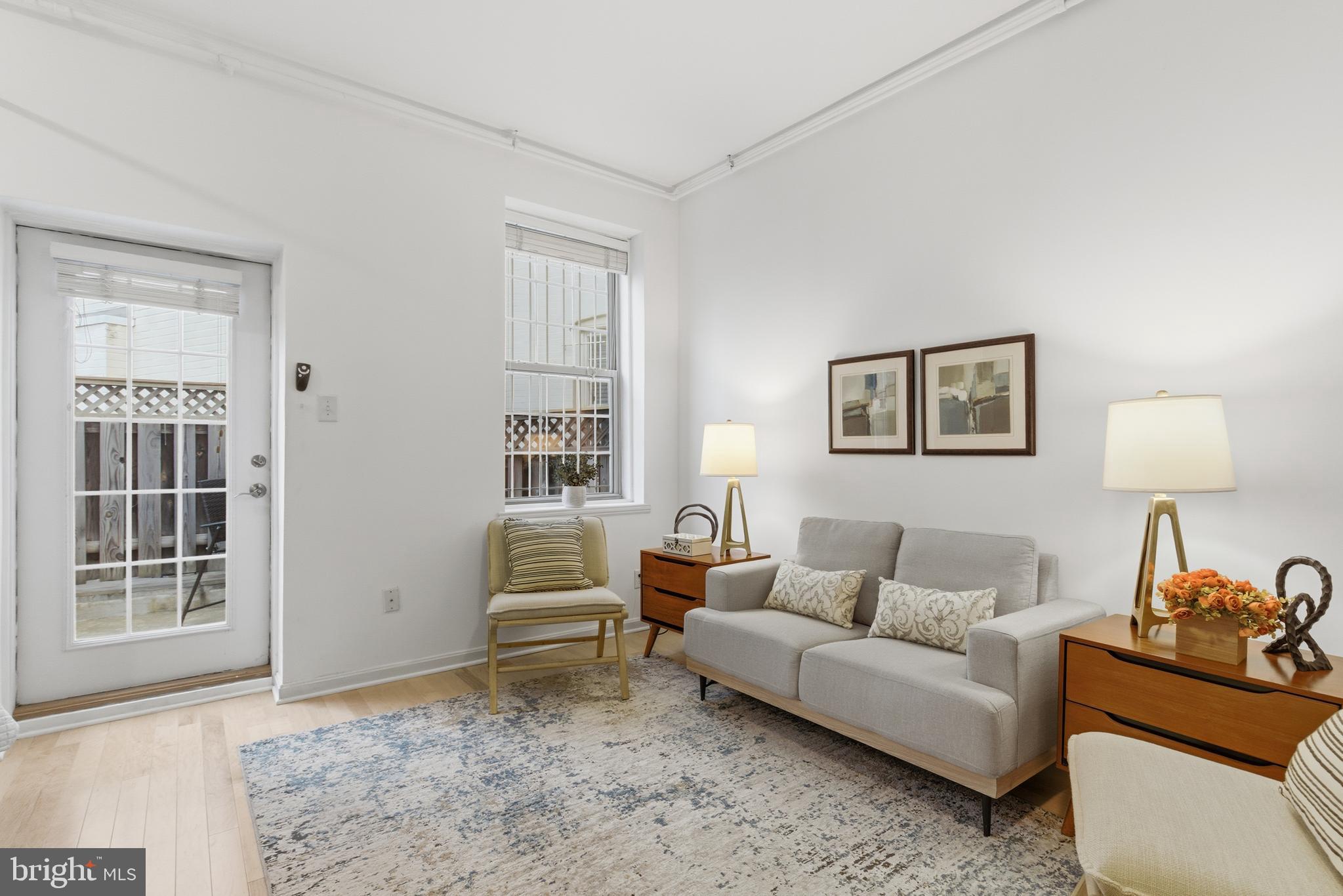 101 North Carolina Avenue Southeast, Unit G Washington, DC 20003 - Photo 2 of 17 a living room with furniture and a window
