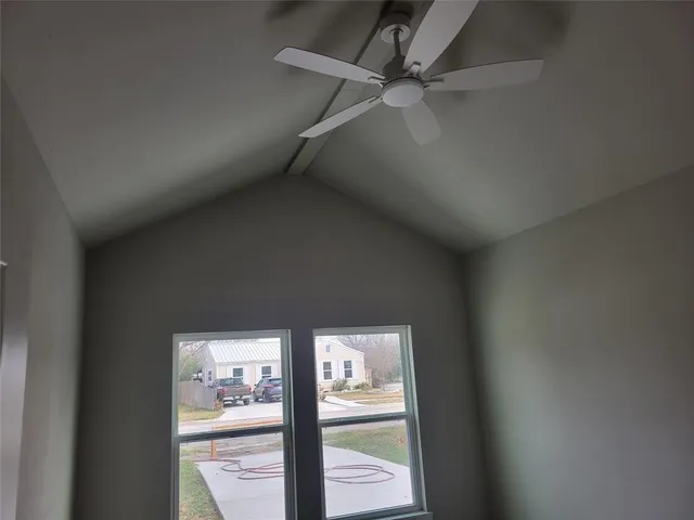 a view of a hallway with a glass door