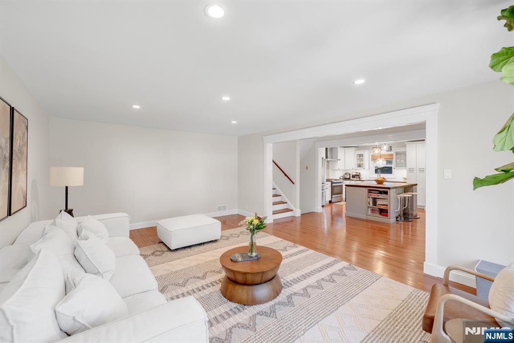 433 Piermont Road Cresskill, NJ 07626 - Photo 5 of 49 a living room with furniture and a wooden floor