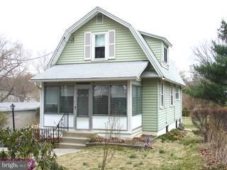 969 Radnor Road Wayne, PA 19087 - Photo 1 of 2 a front view of a house with a yard