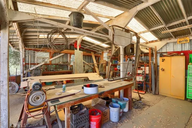 a view of house with outdoor space patio and outdoor seating