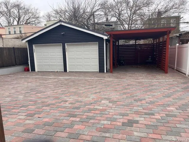 a front view of a house with a garage