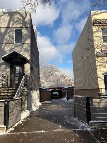 a front view of a house with street