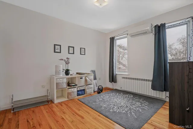 a living room with a rug