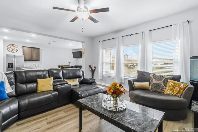 a kitchen with stainless steel appliances granite countertop a sink and stove