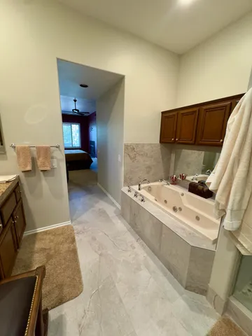 a living room with a couch and a fireplace