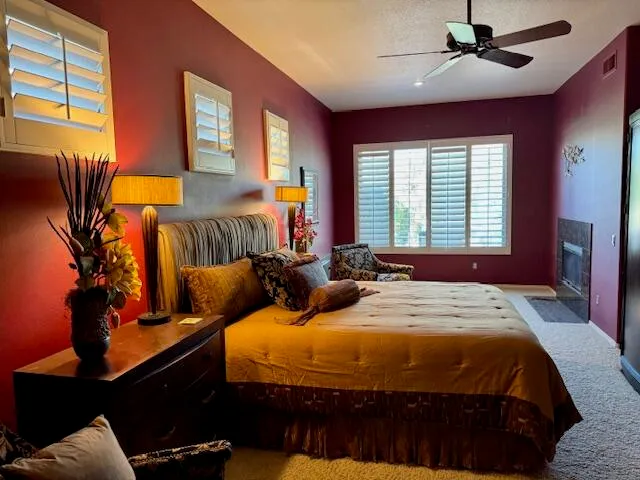 a bedroom with bed and window