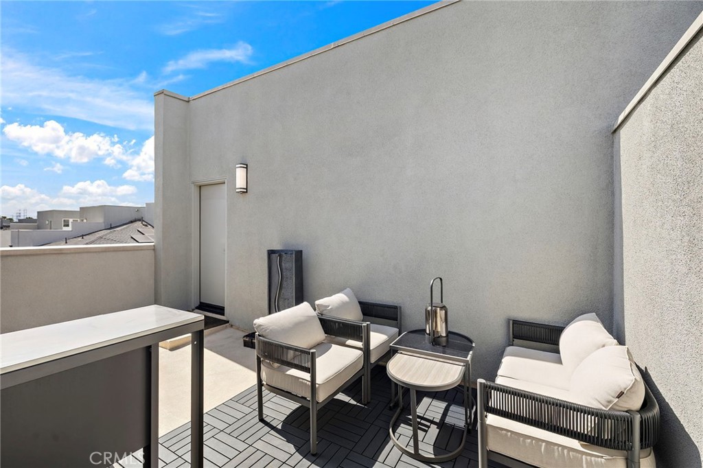 1826 West Bushell Street Anaheim, CA 92805 - Photo 28 of 30 a view of a balcony with chairs