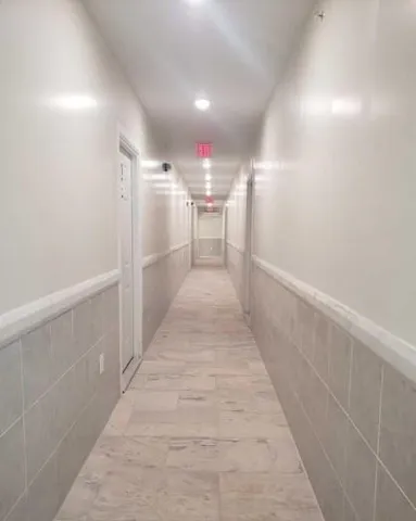 a view of hallway with stairs