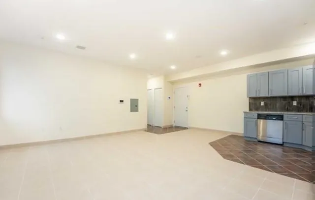 a view of a kitchen with a sink