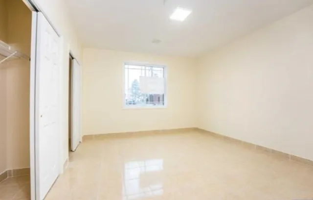 an empty room with windows