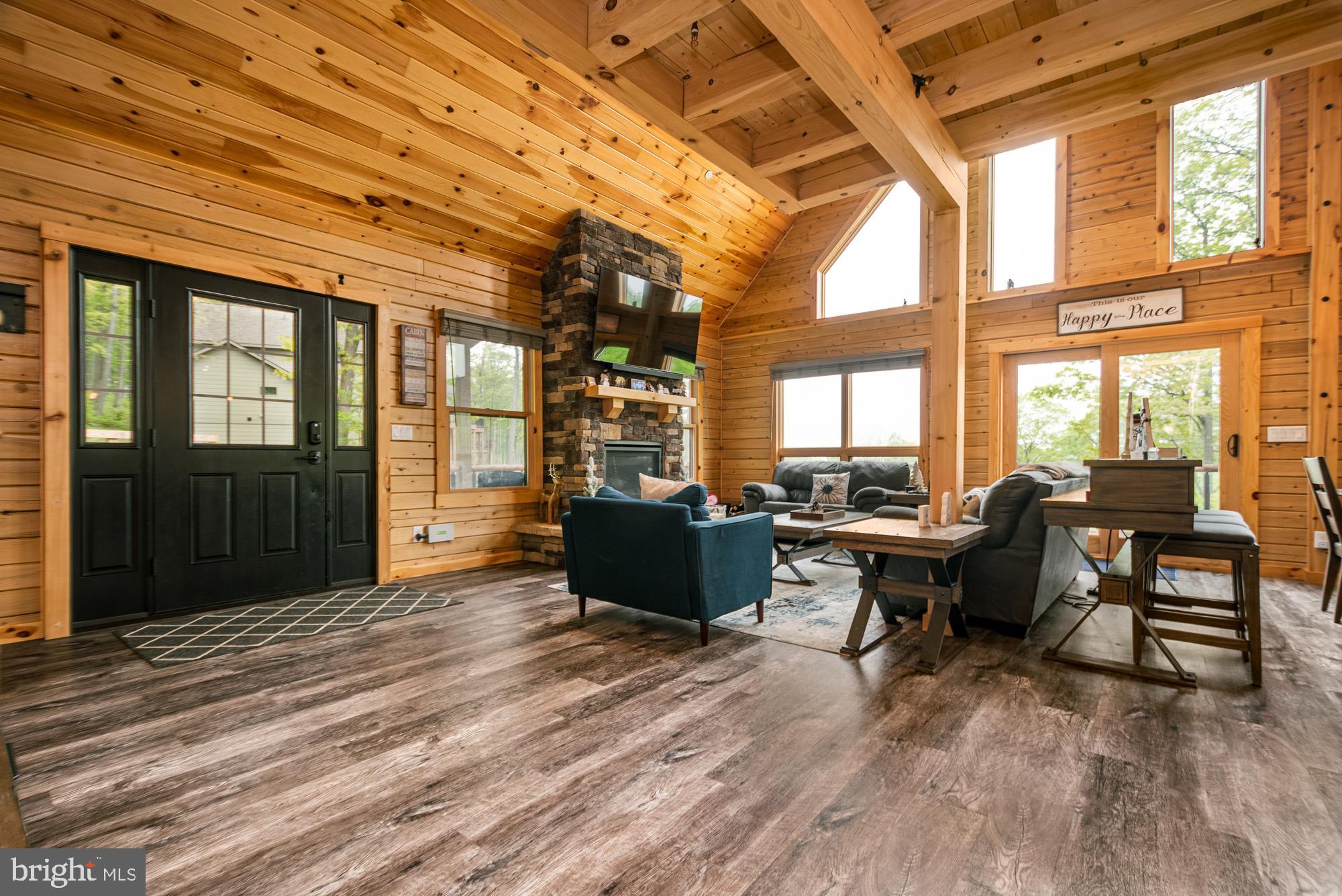 966 Fork Run Trail McHenry, MD 21541 - Photo 19 of 50 a living room with furniture window and wooden floor