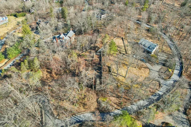 a view of a street with cars