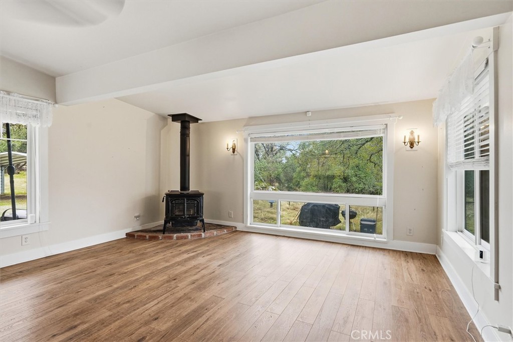 4489 Varain Road Mariposa, CA 95338 - Photo 26 of 39 wooden floor in an empty room with a window