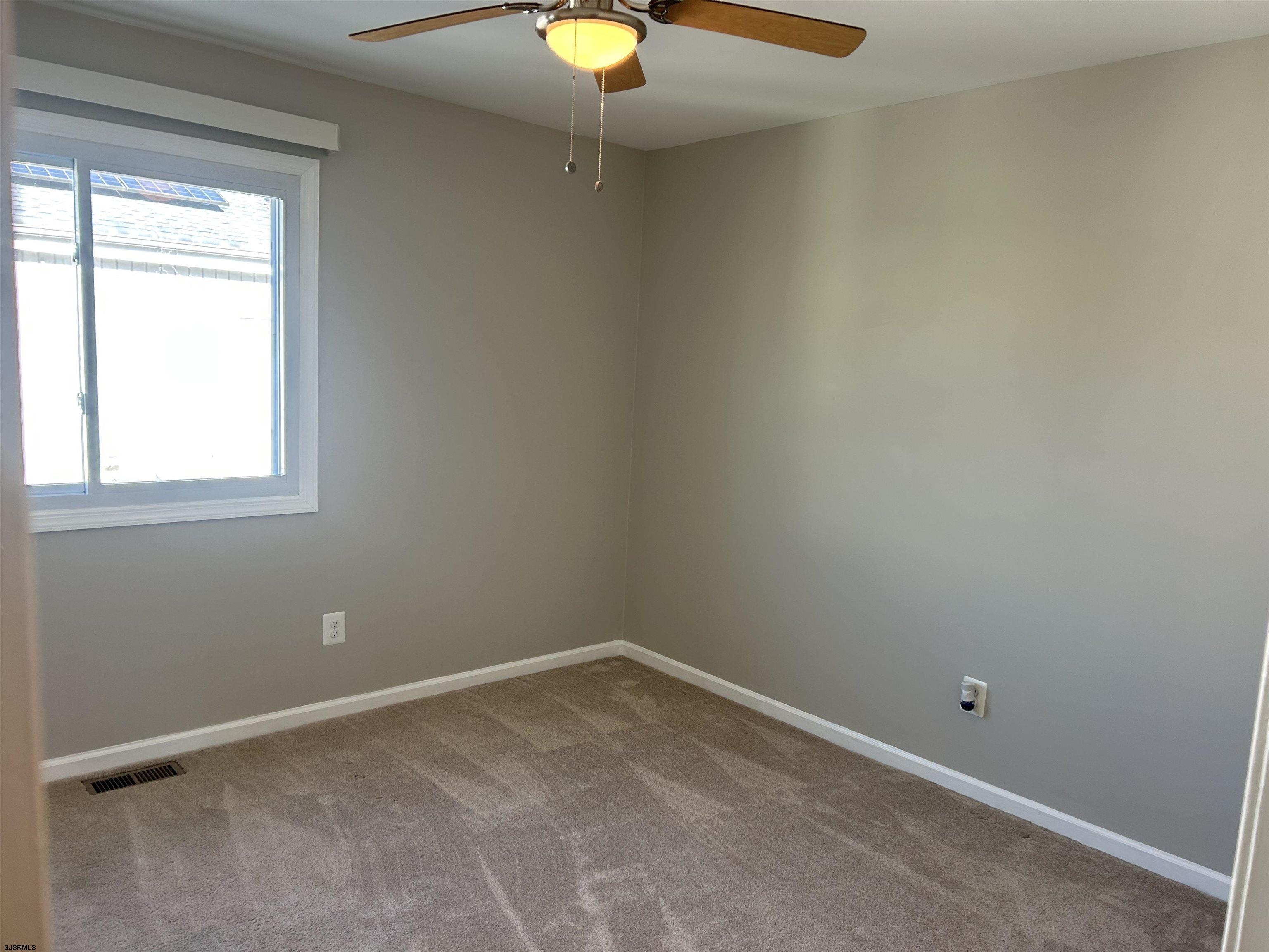 12 Vardon Road Brigantine, NJ 08203 - Photo 20 of 28 an empty room with a window