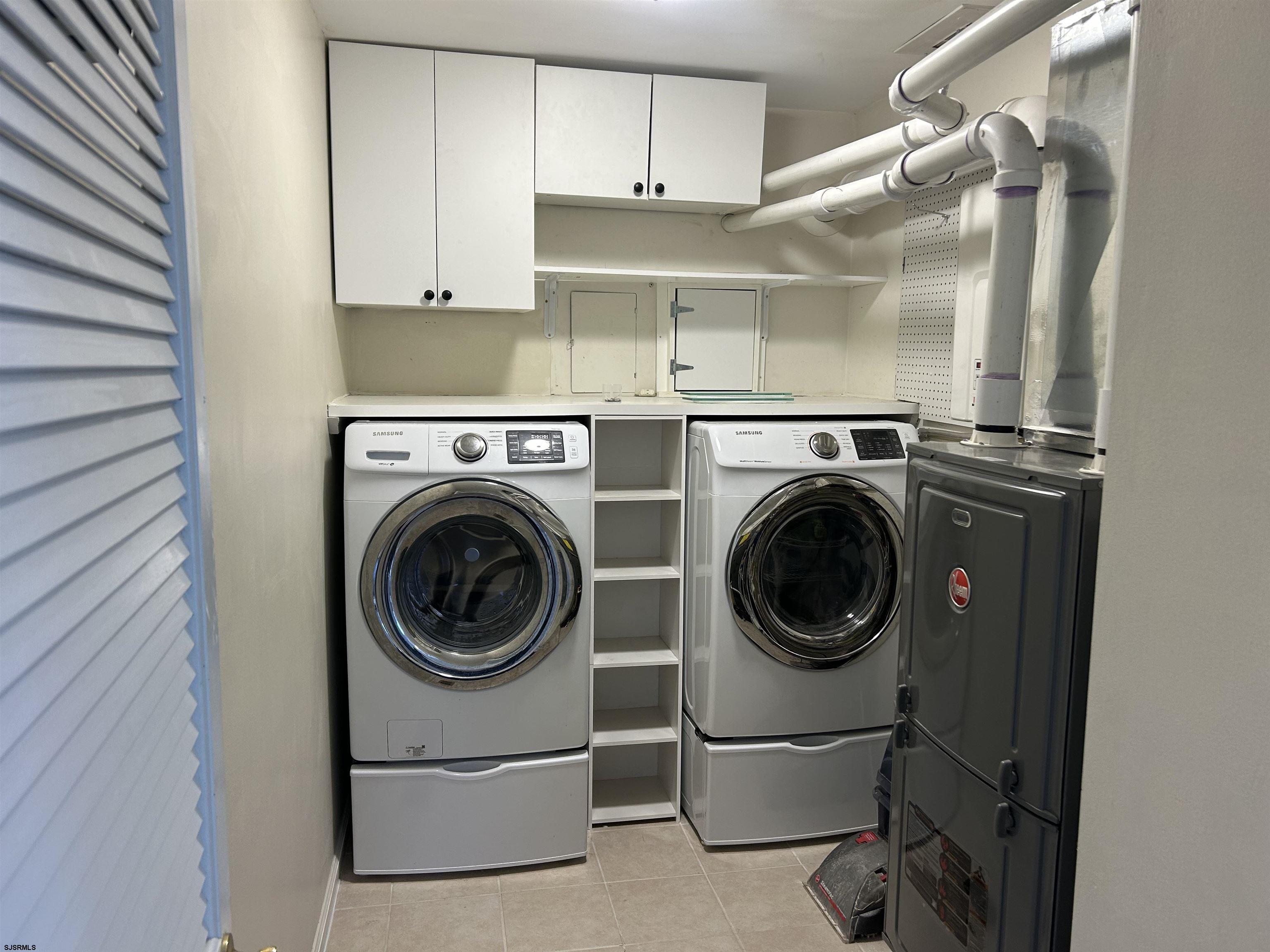 12 Vardon Road Brigantine, NJ 08203 - Photo 21 of 28 a utility room with sink dryer and washer