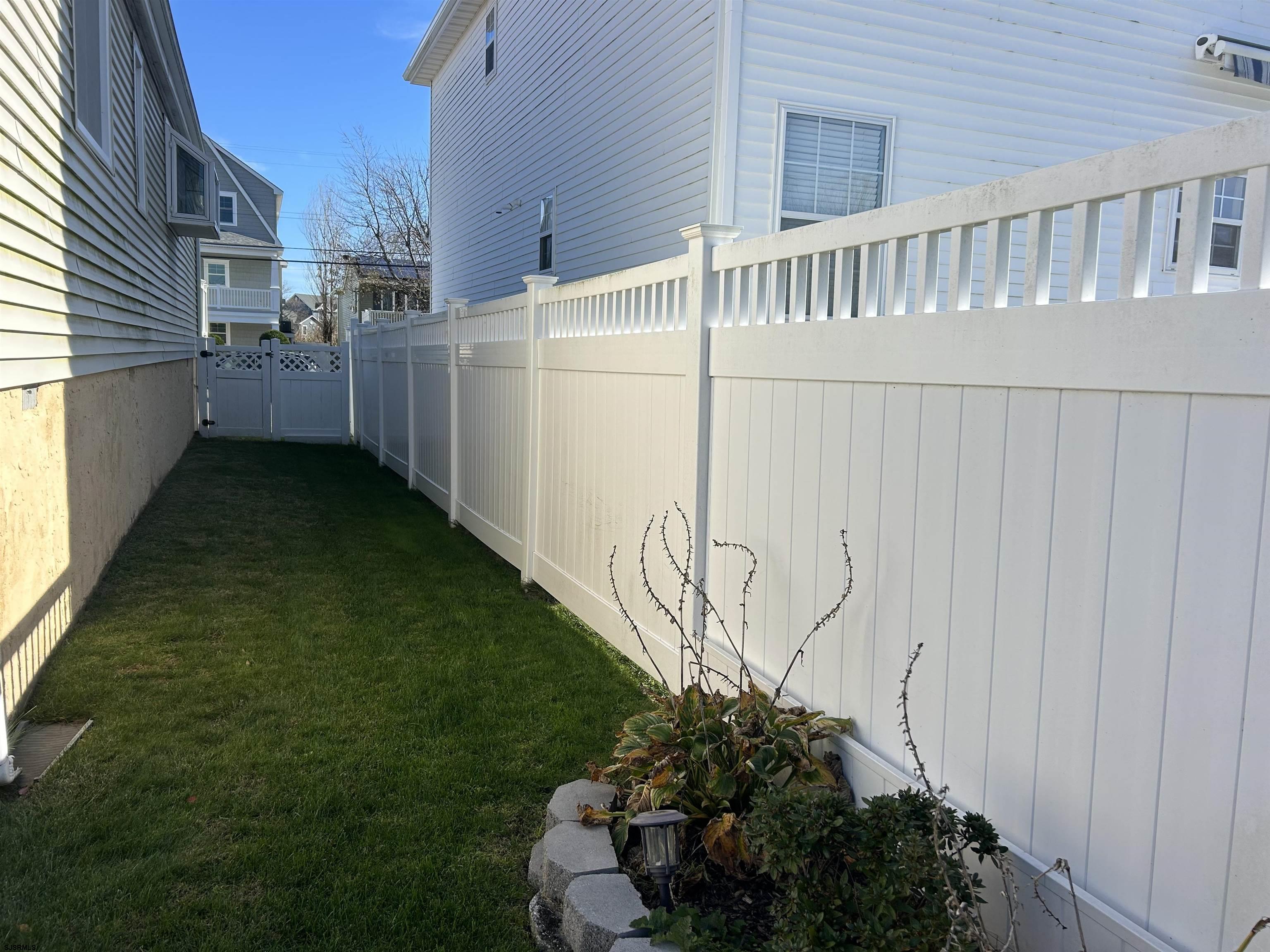 12 Vardon Road Brigantine, NJ 08203 - Photo 24 of 28 a backyard of a house with lots of green space