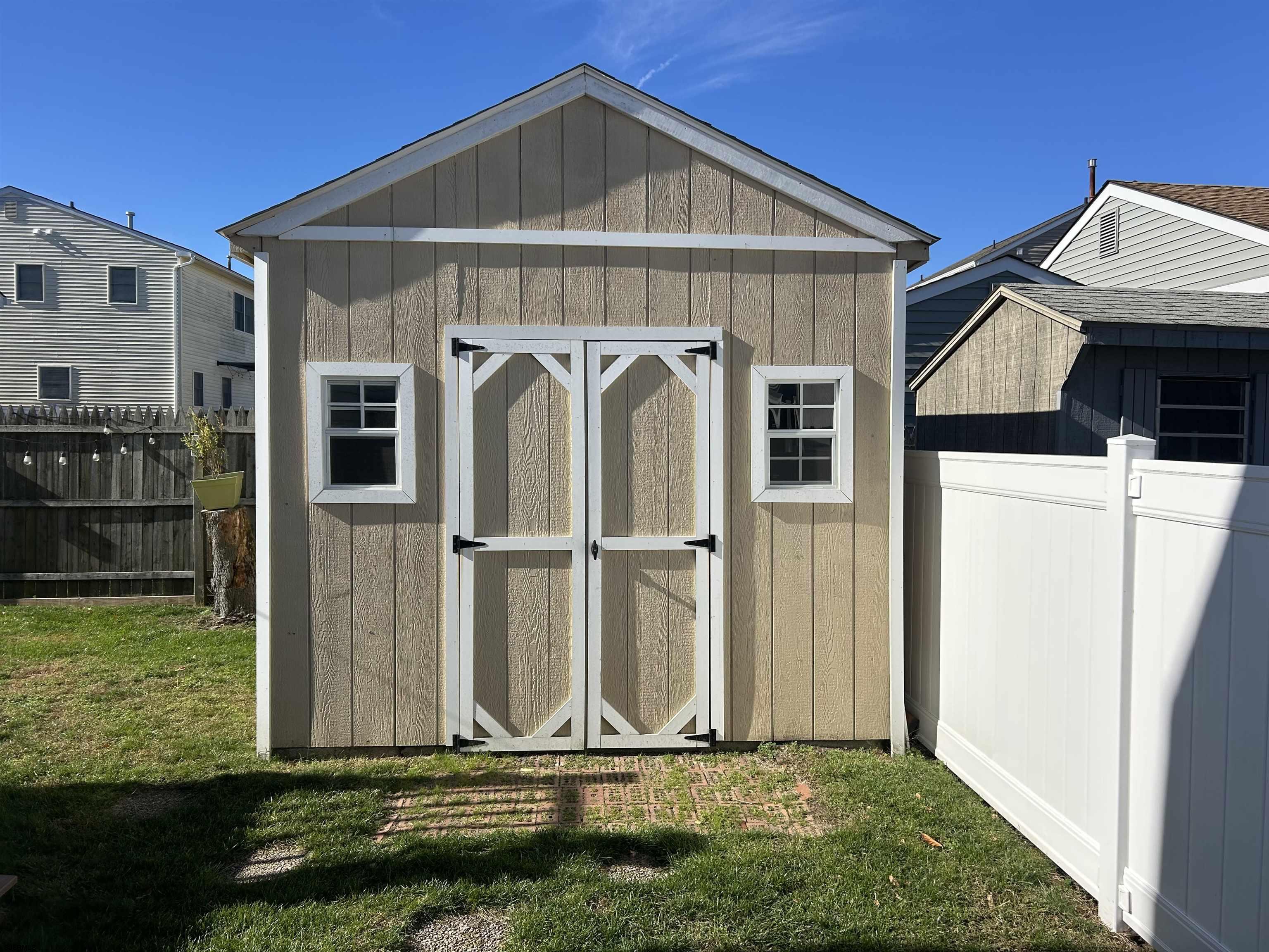 12 Vardon Road Brigantine, NJ 08203 - Photo 27 of 28 a front view of a house with garden