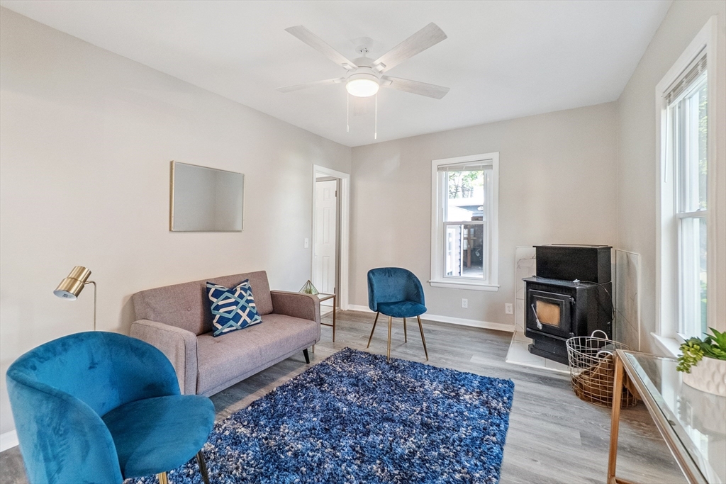 26 Olivine Street Chicopee, MA 01013 - Photo 3 of 26 a living room with furniture and a fireplace