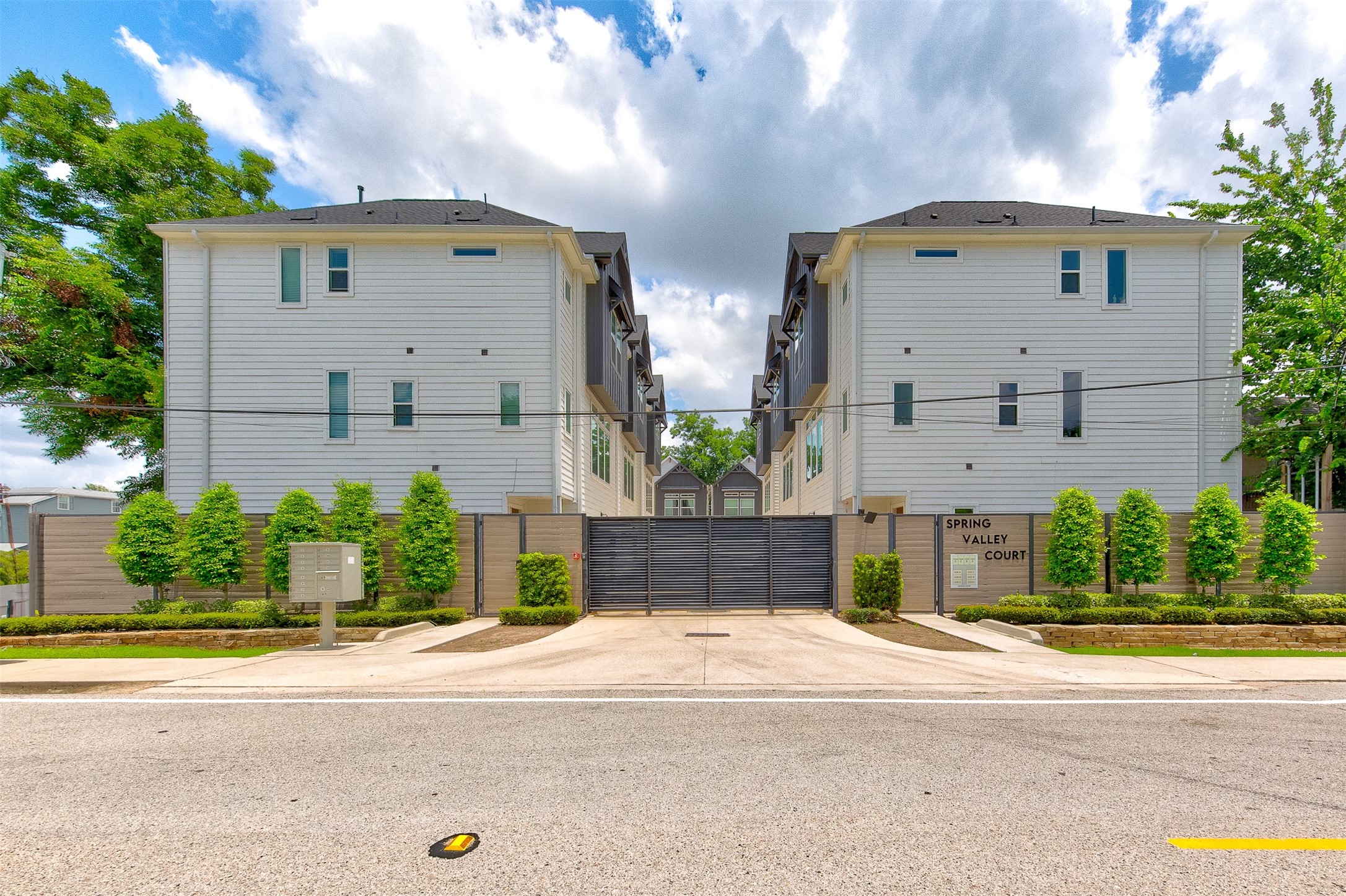 1526 Ojeman Road, Unit A Houston, TX 77055 - Photo 2 of 34 a front view of a house with a yard and a garage