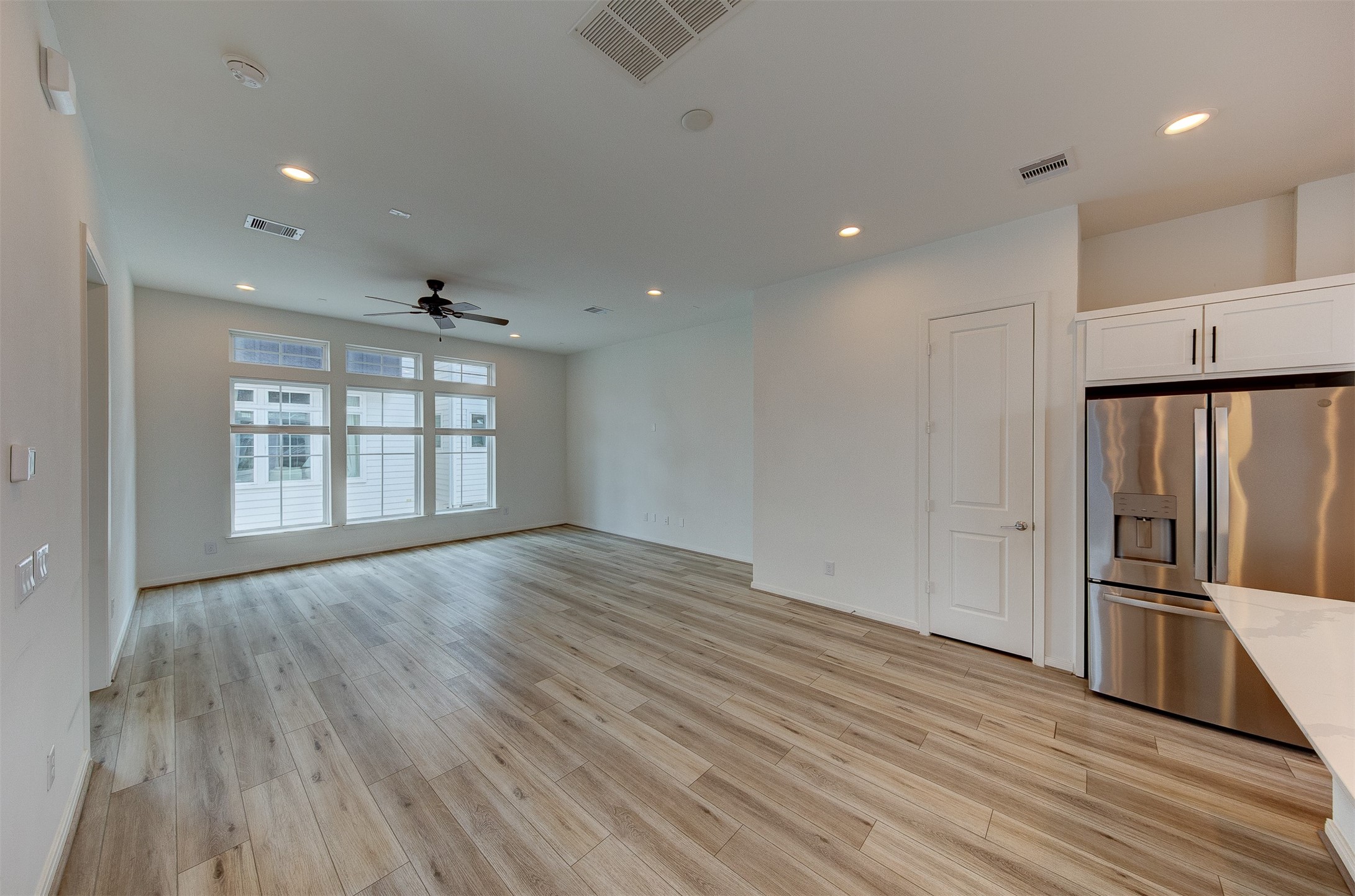 1526 Ojeman Road, Unit A Houston, TX 77055 - Photo 31 of 34 a view of an empty room with wooden floor and a window