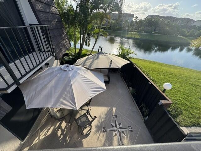 1509 15th Court Jupiter, FL 33477 - Photo 15 of 19 a view of a backyard with sitting area
