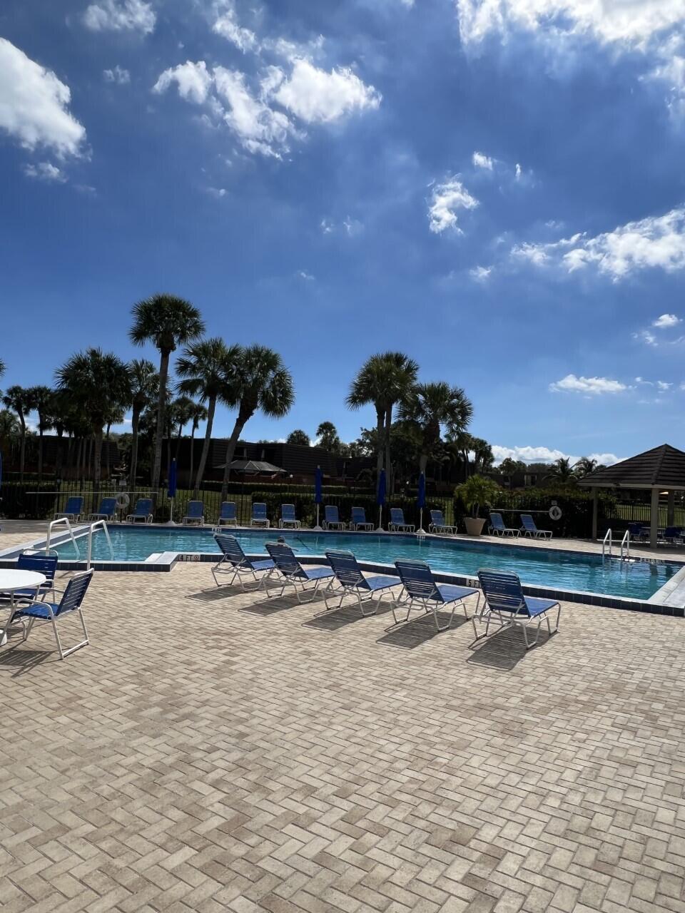 1509 15th Court Jupiter, FL 33477 - Photo 19 of 19 a view of a lake with houses