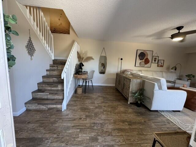 1509 15th Court Jupiter, FL 33477 - Photo 2 of 19 a living room with furniture and stairs