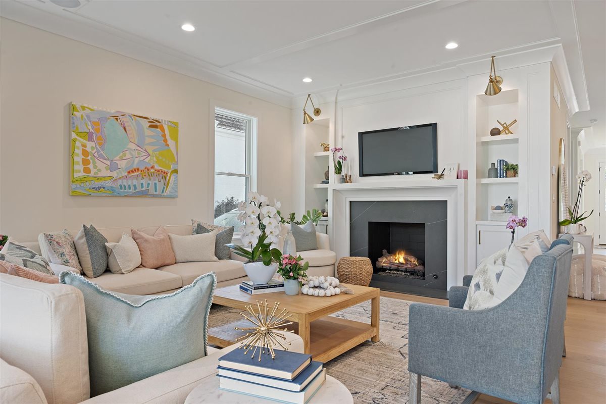 889 Cherry Street Winnetka, IL 60093 - Photo 15 of 76 a living room with furniture a flat screen tv and a fireplace